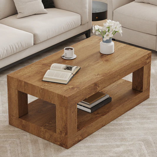 Table basse Mona à double plateau devant un canapé beige