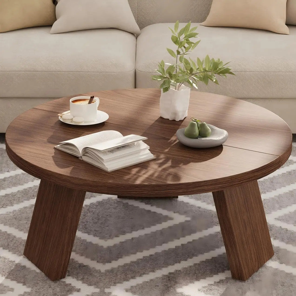 Table basse Léa ronde en noyer, pieds inclinés